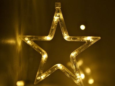 Warm golden light filtering through abstract shapes